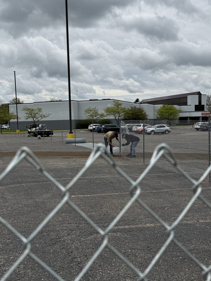 chain link fence in parking lot - during fencing