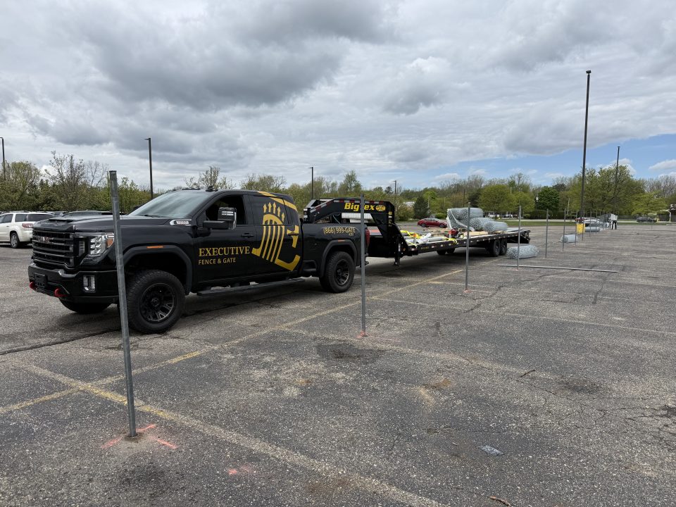 executive fence and gate truck on commercial site