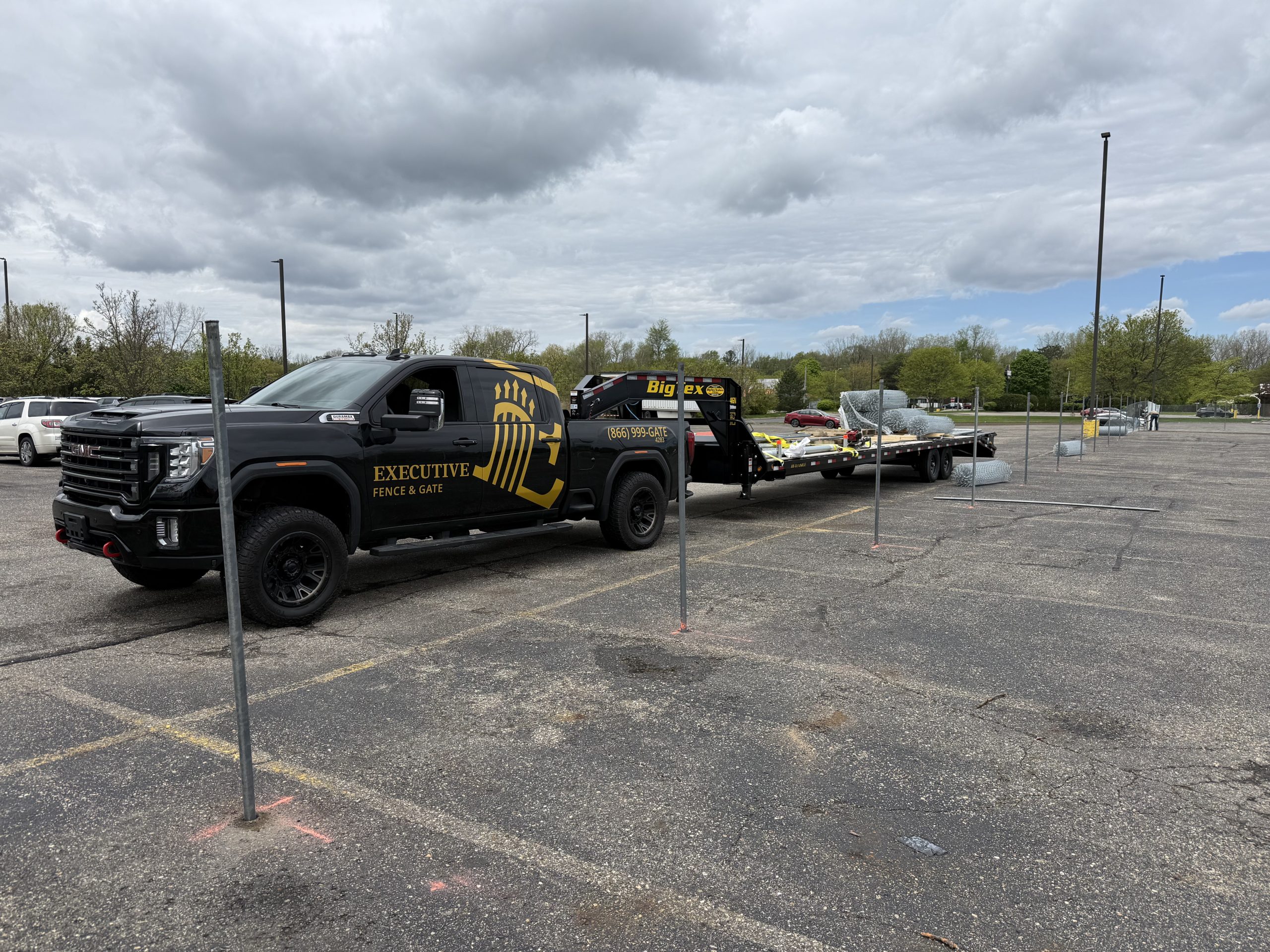 executive fence and gate truck on commercial site
