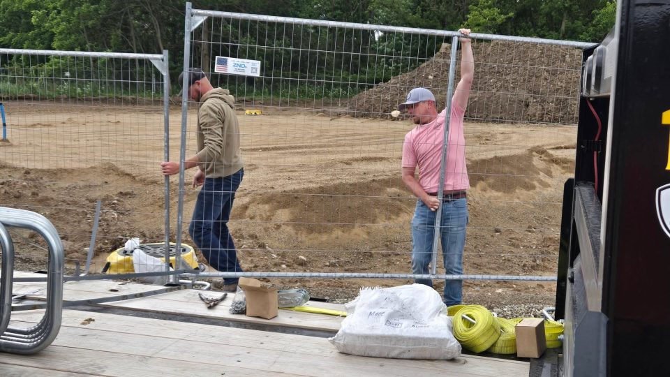 temporary fencing with the crew